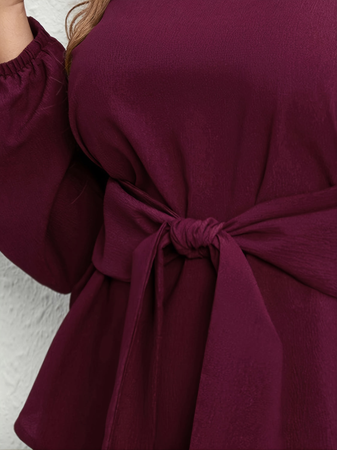 Blusa de manga larga con lazo frontal en tallas grandes