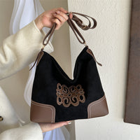 Bolso tote con correa ajustable de gamuza