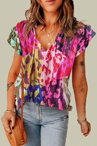 Ruffled Printed Tie Neck Cap Sleeve Blouse