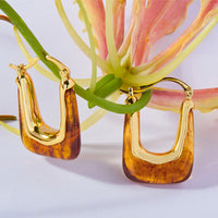 Pendientes en forma de U de resina y cobre