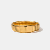 Brazalete de acero inoxidable chapado en oro de 18 quilates