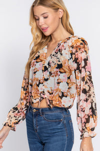 Blusa tejida con estampado y detalle de lazo frontal